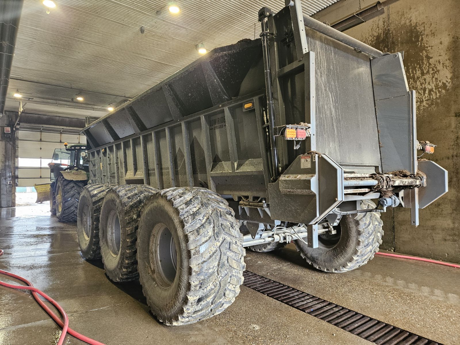 Tracor + trailer inside the wash bay